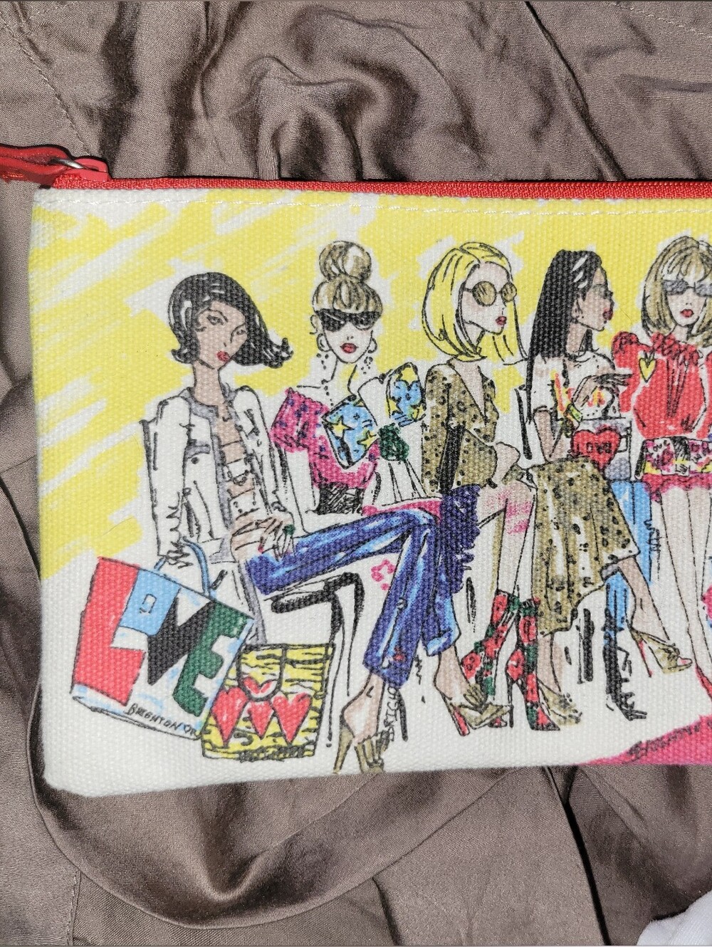 Brighton Yellow Cosmetic Pouch with Red Trim and Multicolor Fashion Illustration